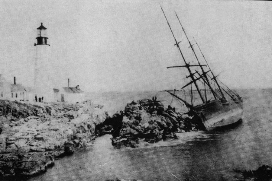 The Bark Anne C. Maguire wrecked at Portland Head Light, ME, on Christmas Eve, 1886.